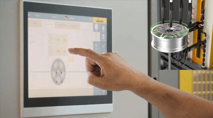 專為汽車輪轂開發(fā)的粉末噴涂系統(tǒng)，通過觸摸屏進(jìn)行系統(tǒng)配置和控制